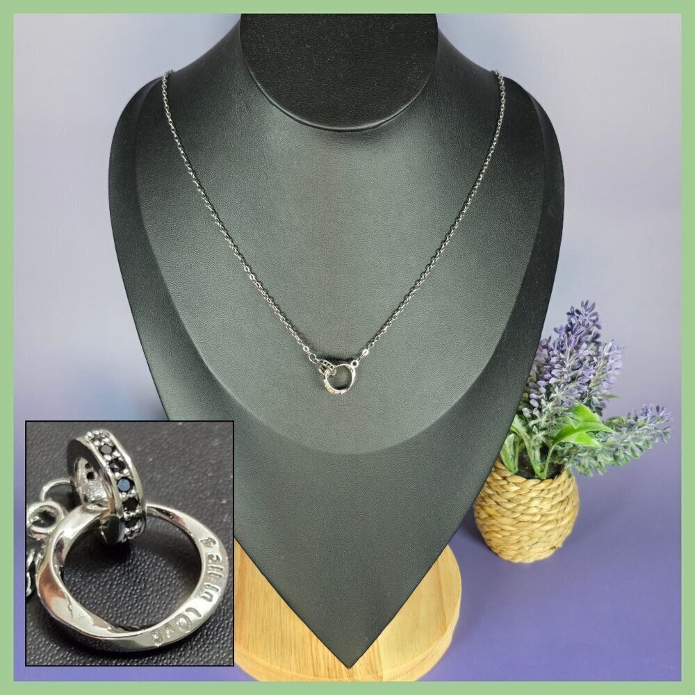 Interlocking‎ Mobius Engraved Necklace in Silver (NWOT)